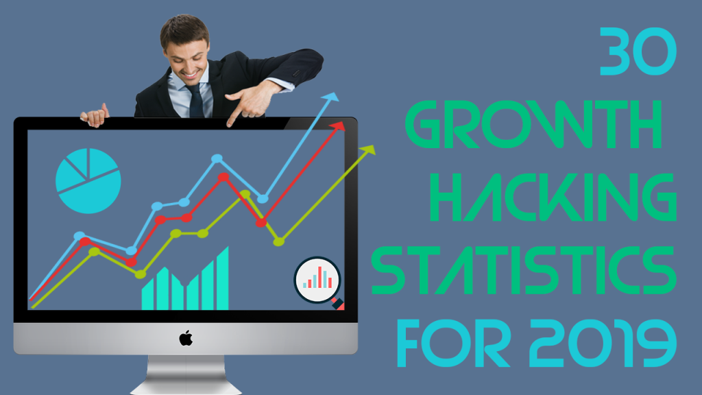 Business man points on statistics on computer screen