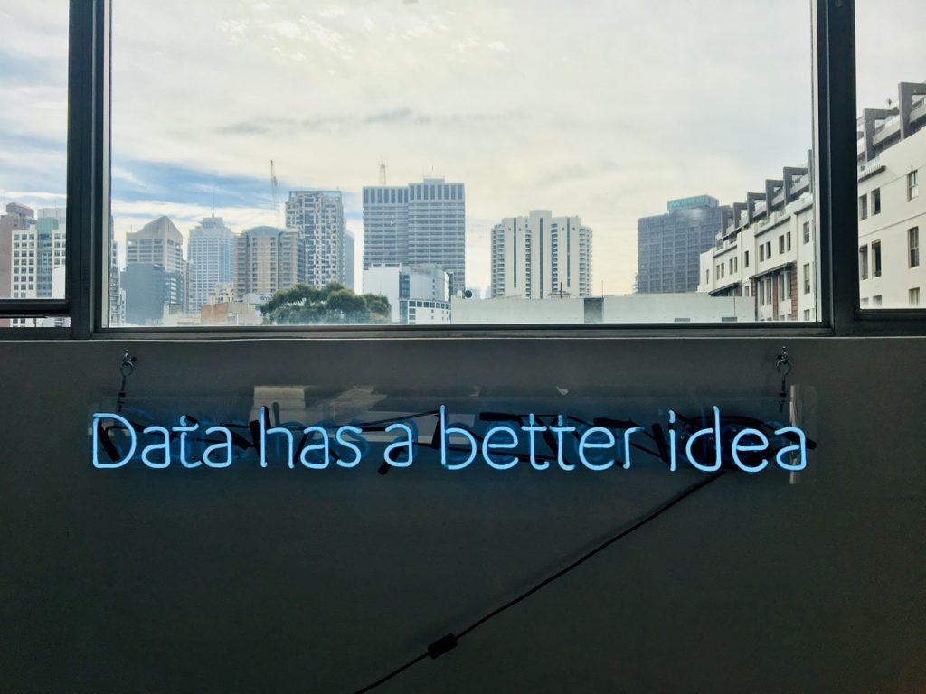 Stock image of neon lights saying "Data has a better idea"
