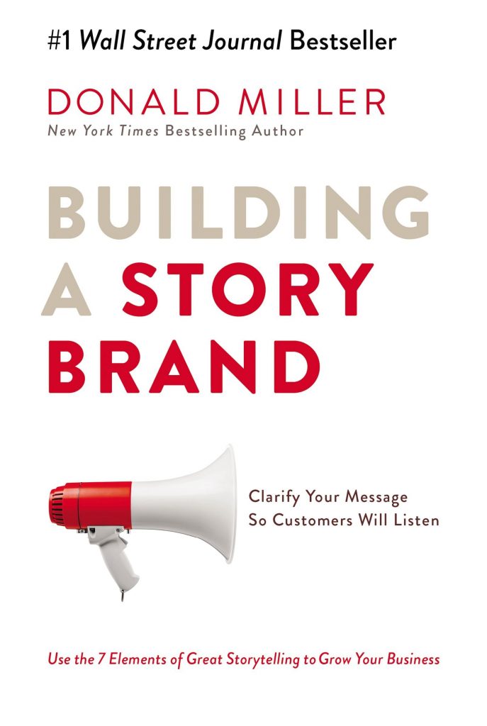 Cover of digital marketing books Building a Story Brand, white background with photo of megaphone