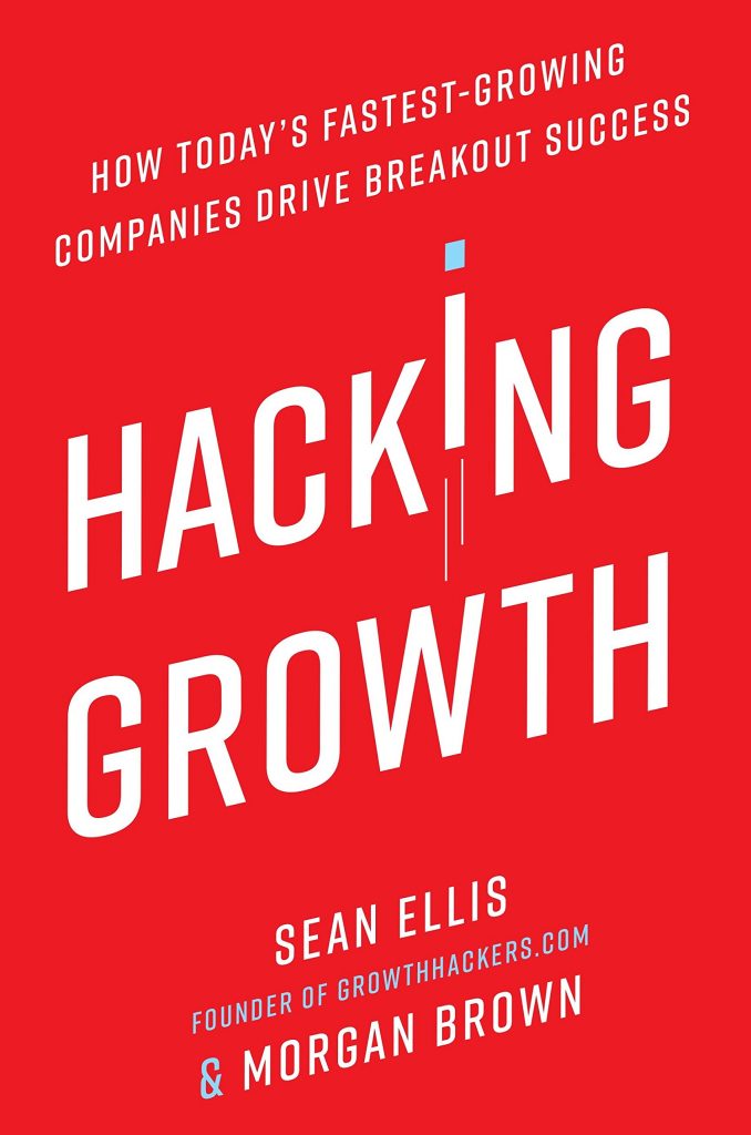 Bright red cover of Hacking Growth, with text in white.