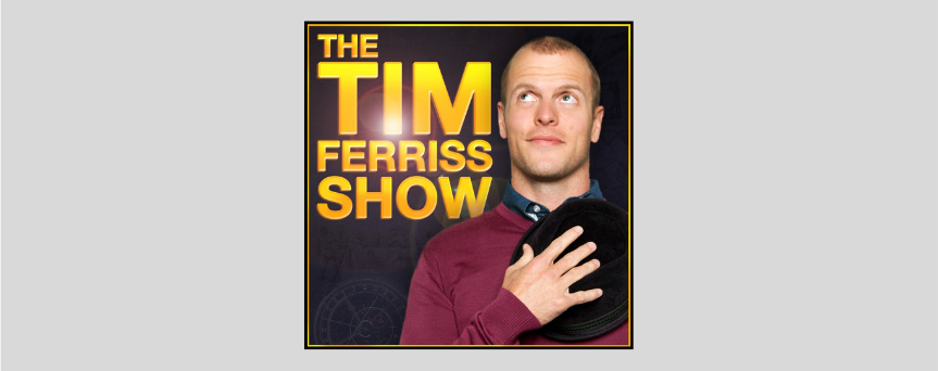 Tim Ferriss holding his cap, with a golden sign on his left, that is "The Tim Ferris Show"