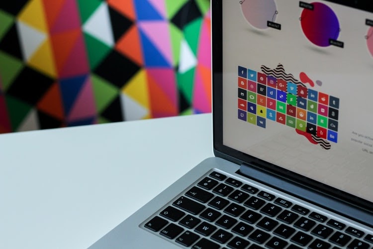 Picture of a laptop with a color puzzle.